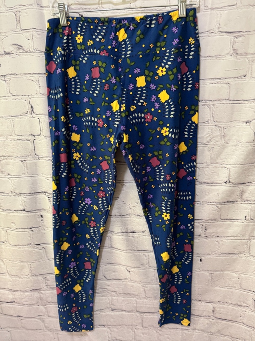 Worn once LuLaRoe TC Floral Leggings in Navy Blue spring & summer floral print - Picture 2 of 9